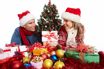 Happy couple with christmas present.