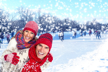 Happy christmas couple in winter clothing.