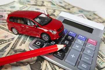 Car money and calculator.