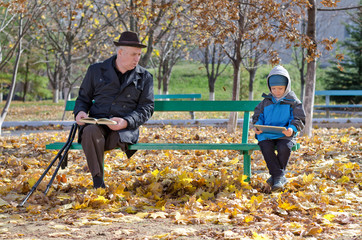 Grandfather watching over his young grandson