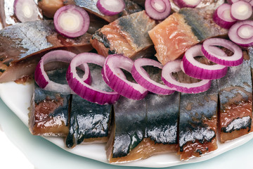 Pieces of herring with onions