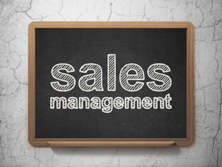 Marketing concept: Sales Management on chalkboard background
