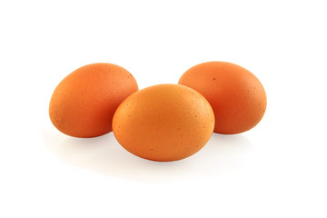 three eggs isolated on white background