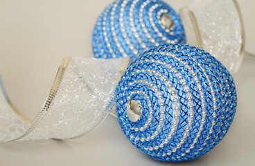 Blue christmass balls and decoration ribbon