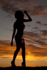 silhouette woman dance arm up