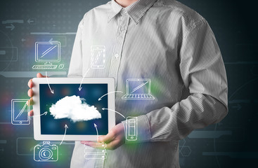 Businessman showing hand drawn cloud computing