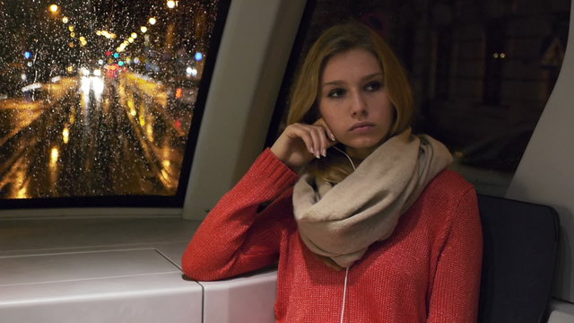 depressed woman on a tram