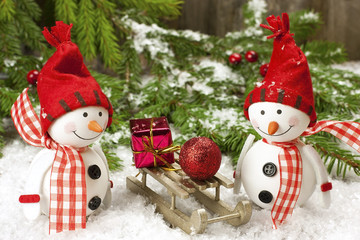Christmas still life with snowmen and decoration