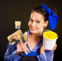 Builder woman with wallpaper.