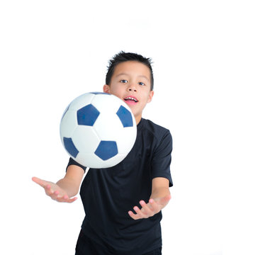 Boy Bouncing Football with Hands