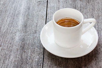 Ceffee cup on wood table with copy space.