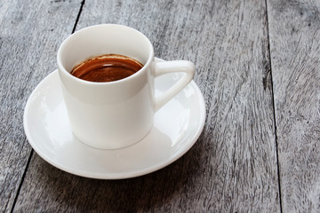 Ceffee cup on wood table with copy space.