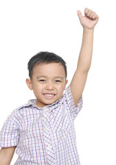 cheerful smiling little boy raised his hands up.
