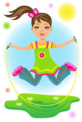 The beauty little girl jumps on a skipping rope
