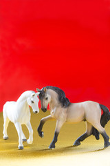 赤バックと二頭の馬