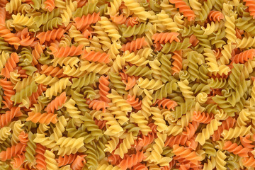 Italian pasta fusilli background.