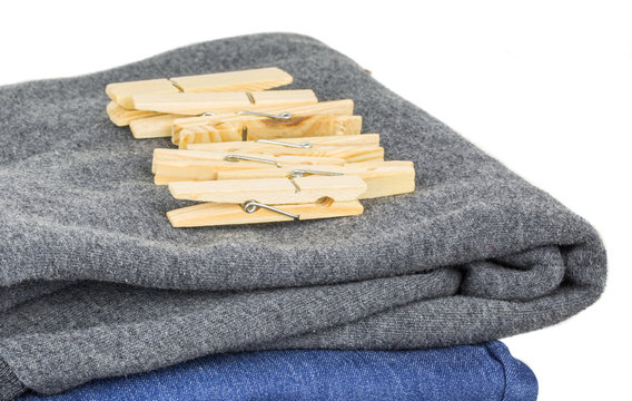 A Bunch Of Clothes Peg And Laundry In A Wicker Basket