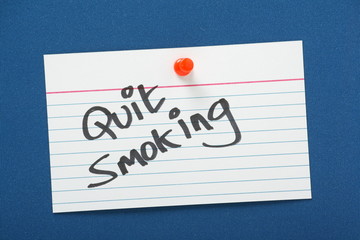Quit Smoking reminder on a blue notice board