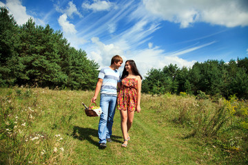 Fototapeta na wymiar couple in love walking in nature