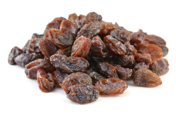 pile of raisins on white background