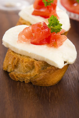 Bruschetta with mozarella and tomatoes