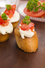 Bruschetta with mozarella and tomatoes