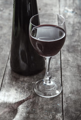 glass and bottle of red wine
