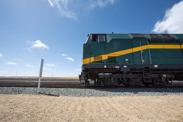 Naklejka premium Train Lhasa - Shanghai stopped in a train station in Tibet