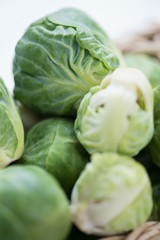 Fototapeta premium Close-up of fresh brussels sprouts, vertical shot