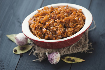 Braised cabbage, garlic, pepper and bay leaves, studio shot
