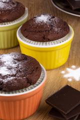 Three muffins with dark chocolate