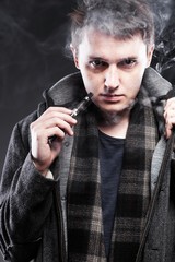 Man smoking electronic cigarette