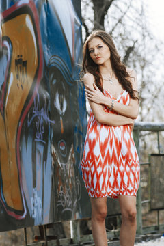 Beautiful young multicultural woman outdoors in a fashion pose.