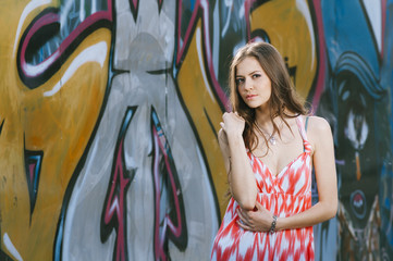 Beautiful young multicultural woman outdoors in a fashion pose.