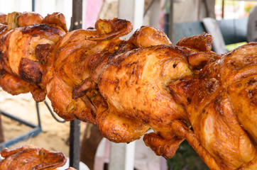 Naklejka premium Grilled chicken on the spit thai food