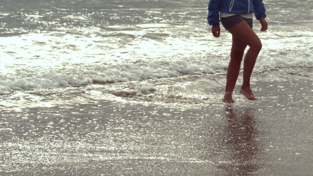 Woman walking at the beach