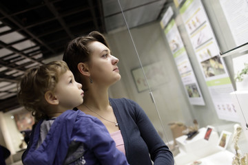Family at excursion in historical museum