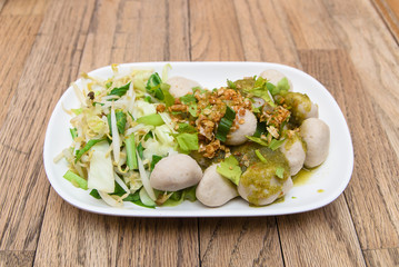 Boiled pork ball with spicy dipping sauce and vegetable
