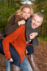 Happy young couple in the autumn