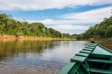 Gordijnen boat in the river in the peruvian Amazon jungle at Madre de Dios © snaptitude