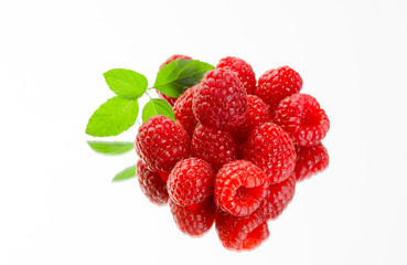 Fresh organic ripe raspberries on white background