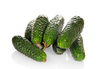 Fresh green cucumbers in drops the waters