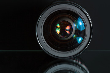 Professional photo lens in dark background