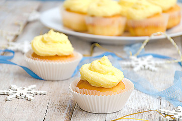 Two vanilla Christmas cupcakes