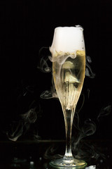 champagne flute with ice vapor