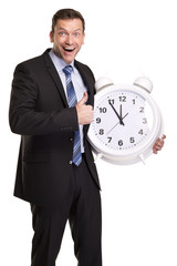 Geschäftsmann mit riesiger Uhr / Wecker