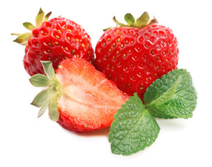 Strawberry and mint isolated on white.