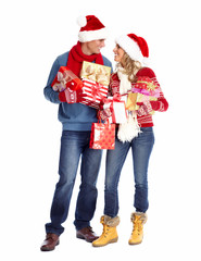 Happy couple with christmas gifts.