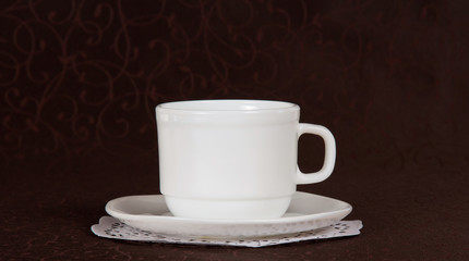 Saucer and cup on a napkin