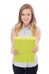 Young student with books on white